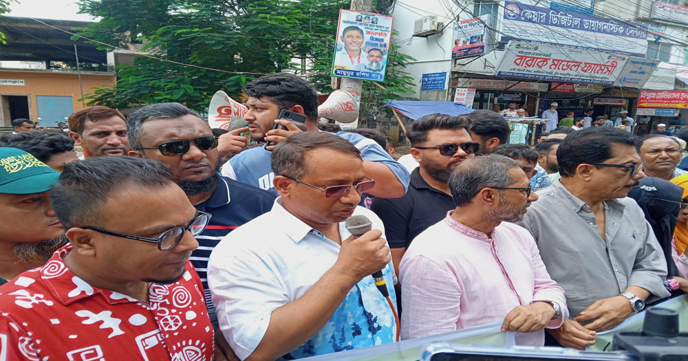 ভাঙ্গা মহাসড়ক চার লেন উন্নতি করার দাবিতে মানববন্ধন